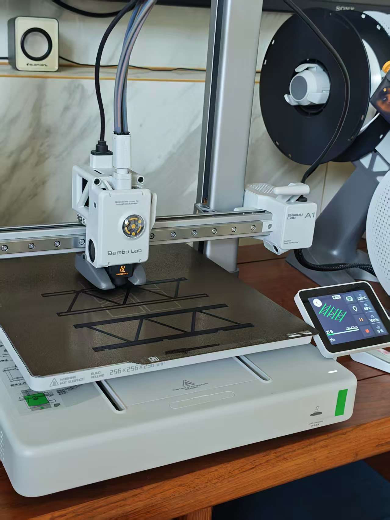 Bambu Lab 3D printer printing lattice bridge structure